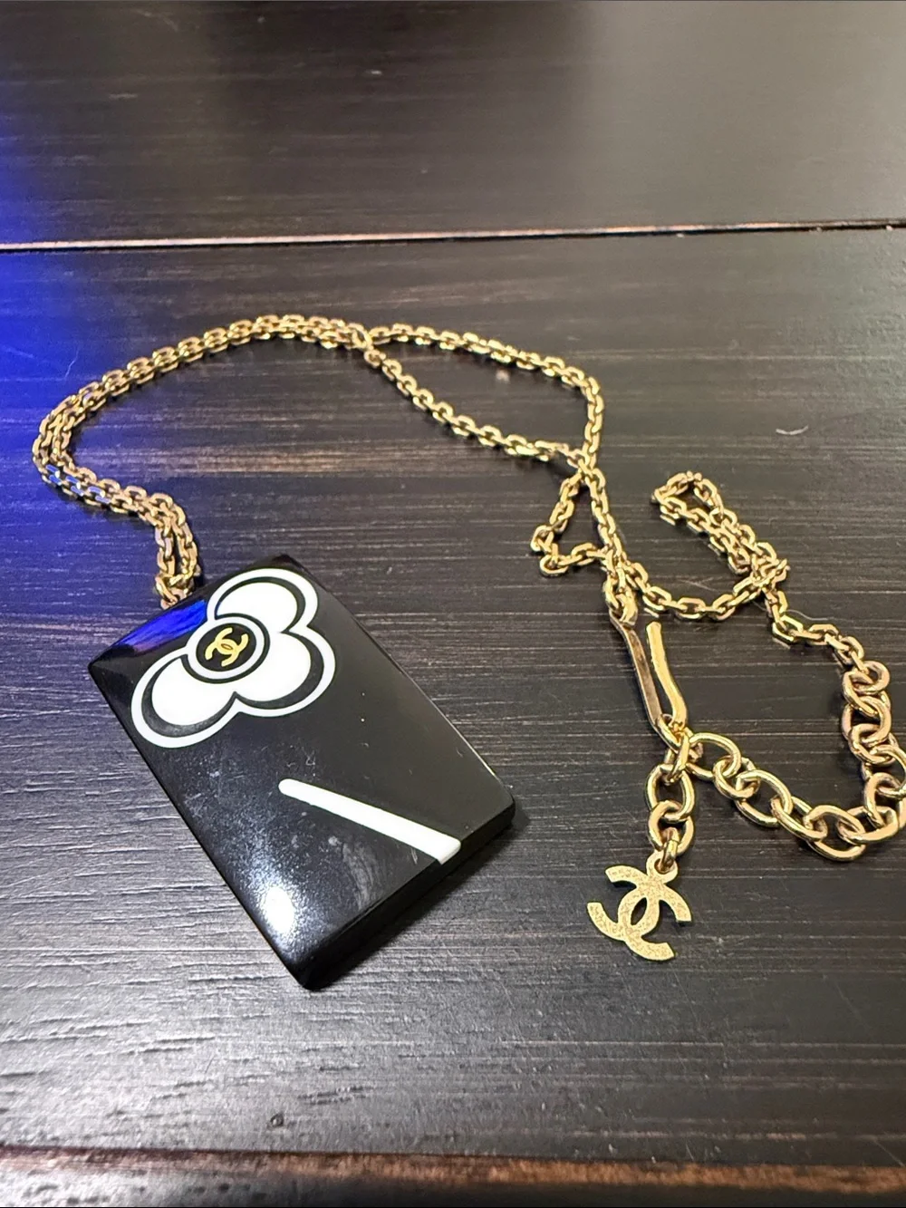 CHANEL Black and White Camellia Pendant with Gold Chain